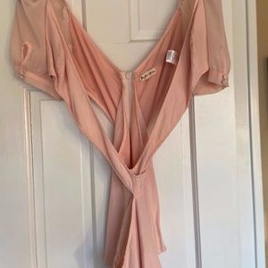 Peek a boo blouse with midsection exposed